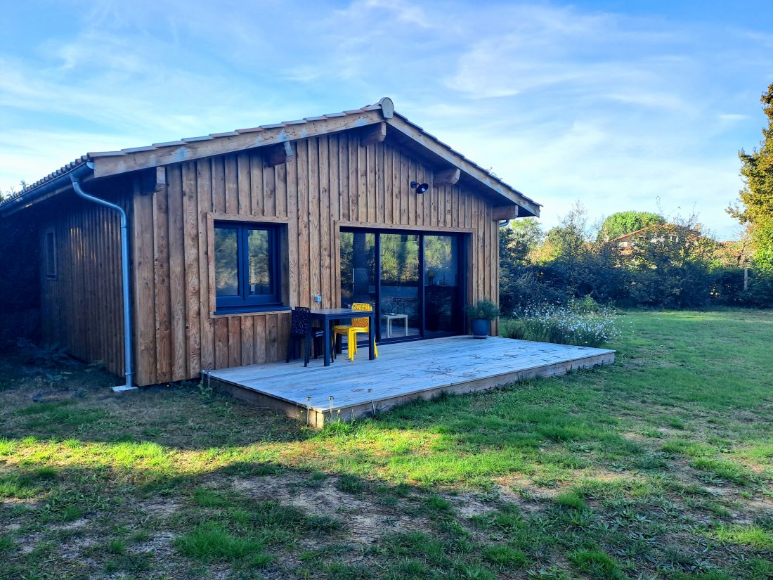 Chalet ossature bois 35m2 avec terrasse pin US